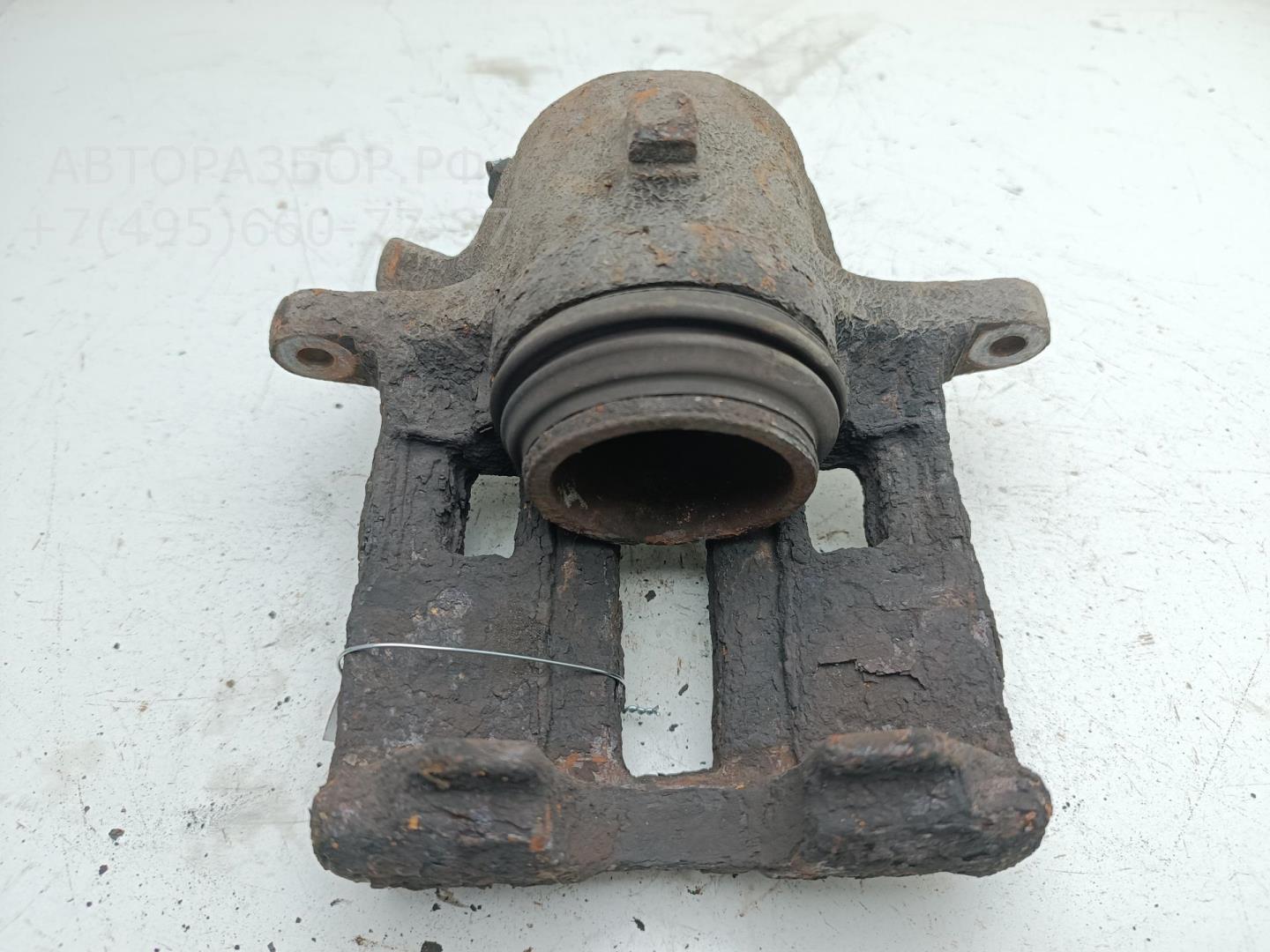 Суппорт передний левый