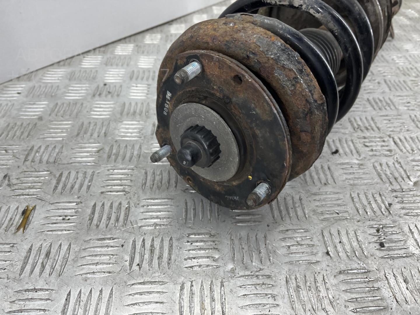 Амортизатор передний левый