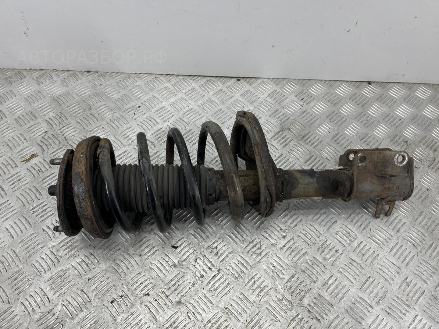 Амортизатор передний левый