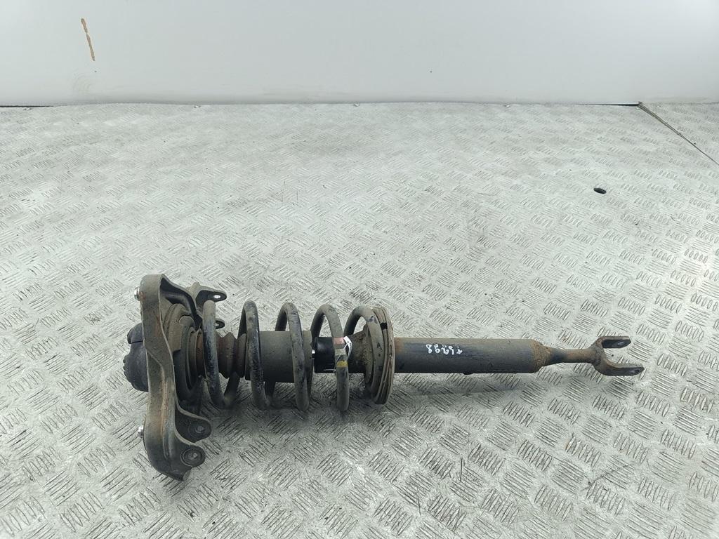 Амортизатор передний левый