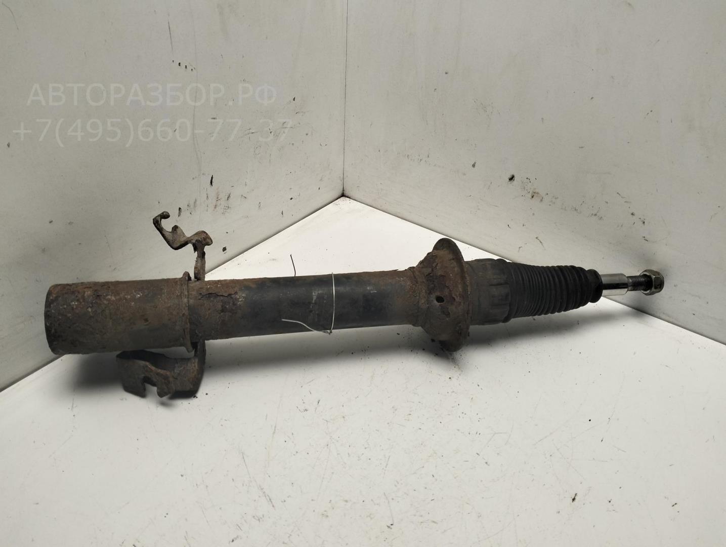 Амортизатор передний левый