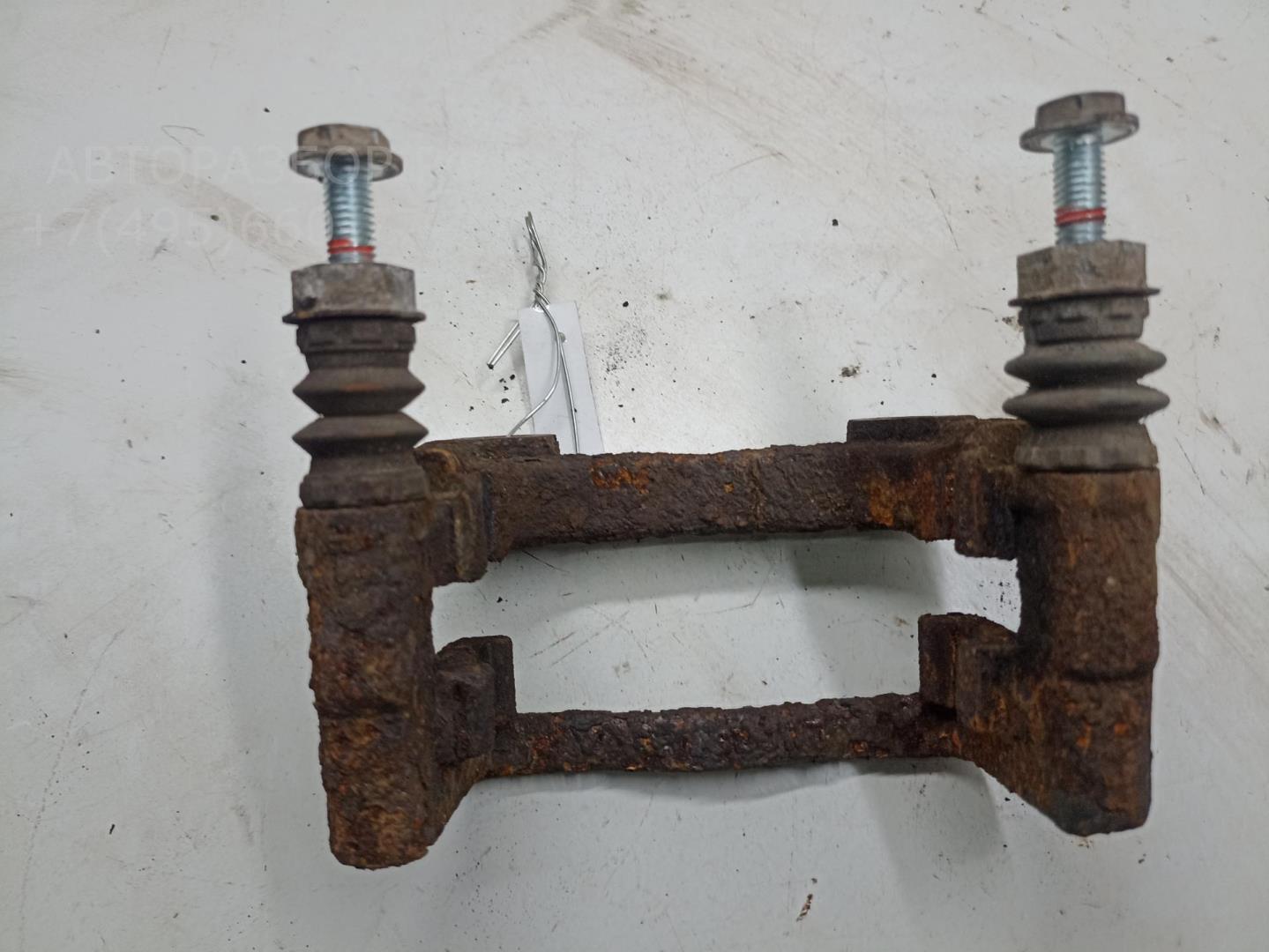 Скоба суппорта заднего