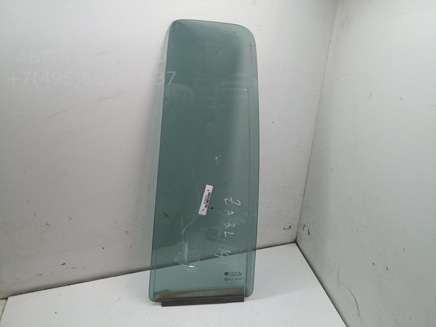 Стекло двери задней левой (форточка)