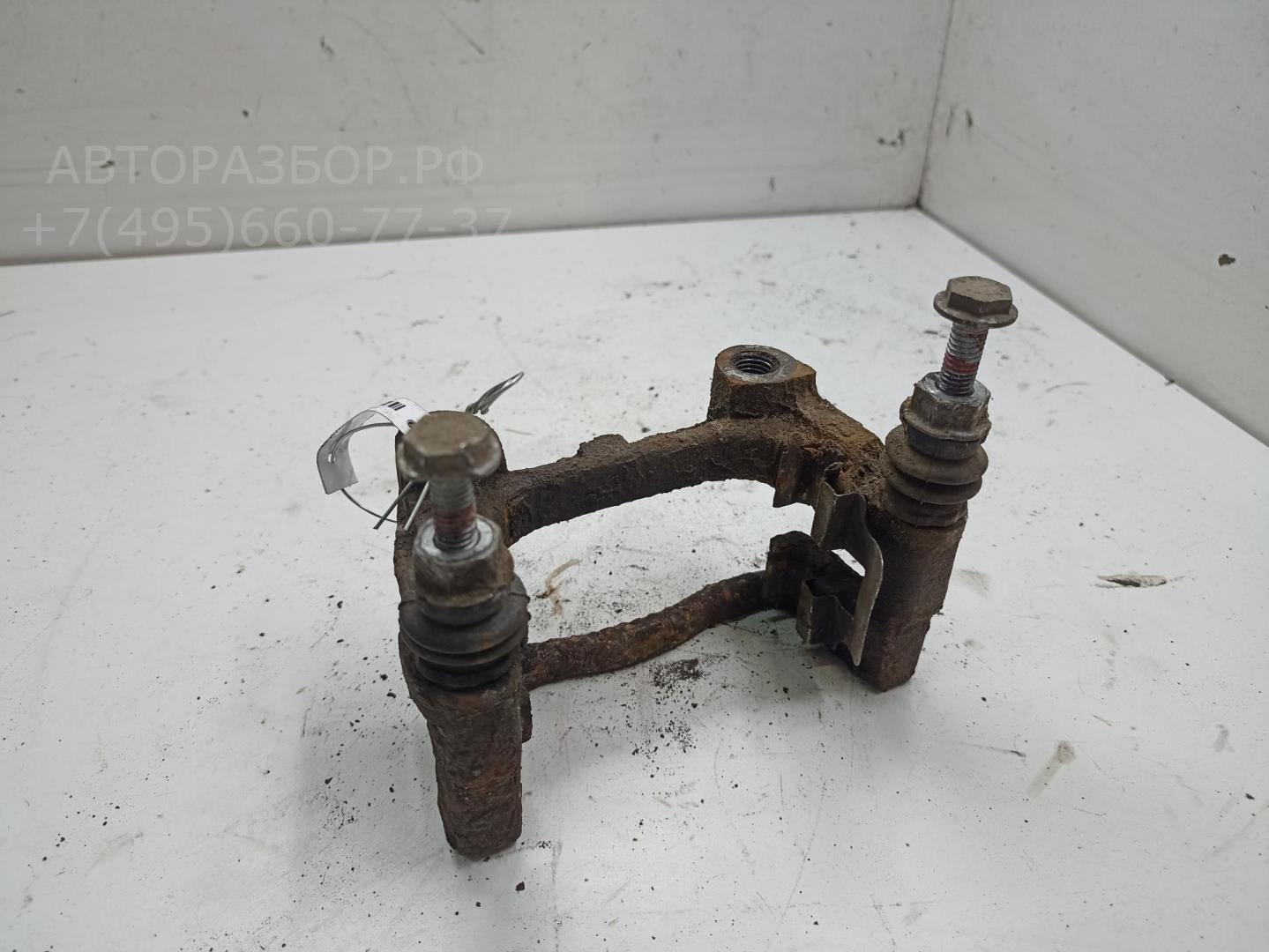 Скоба суппорта заднего