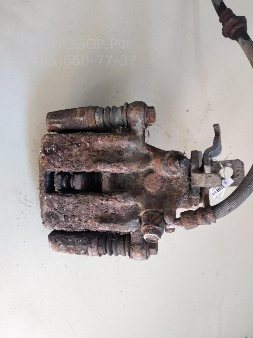 Суппорт задний левый