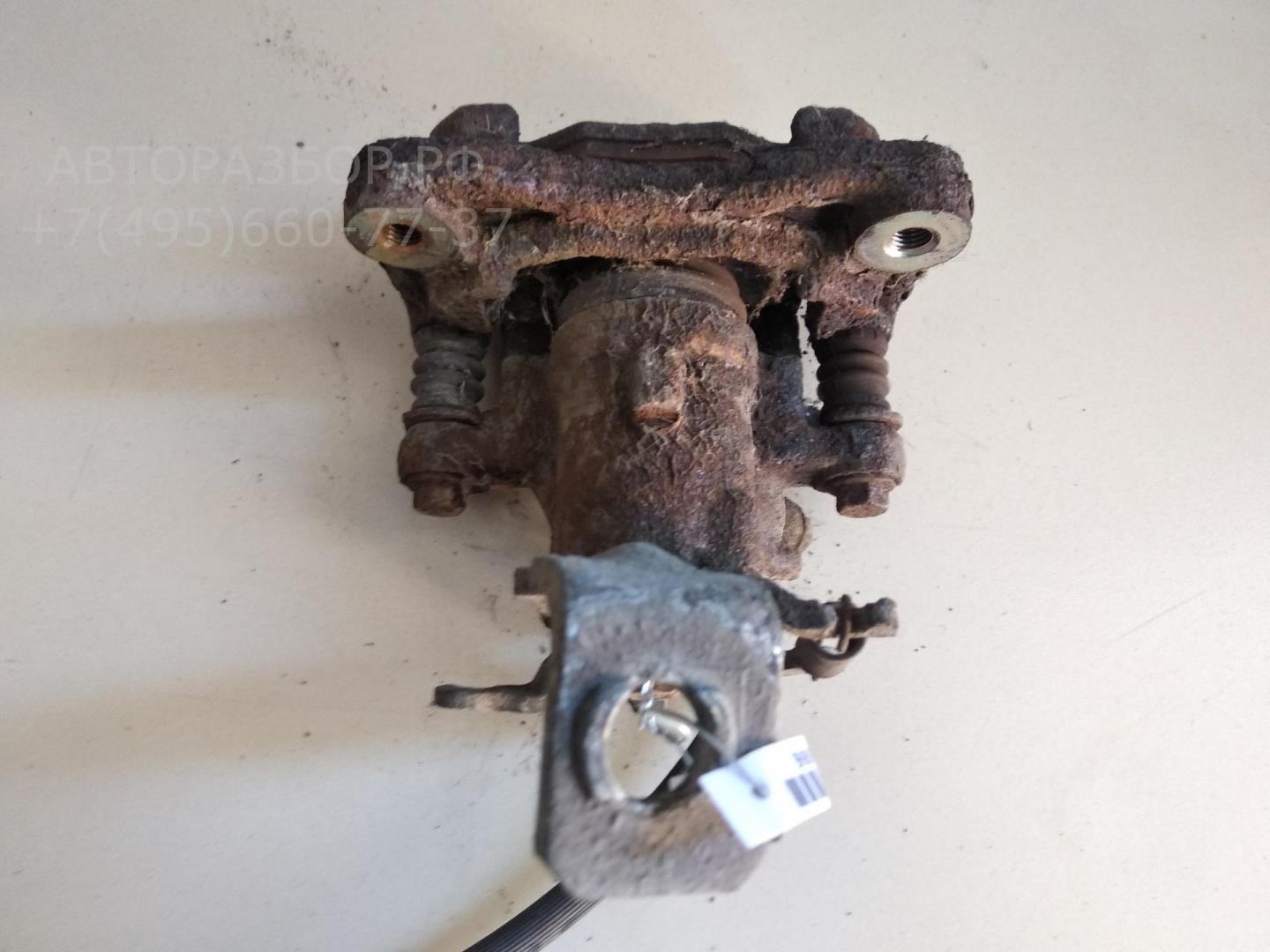 Суппорт задний левый