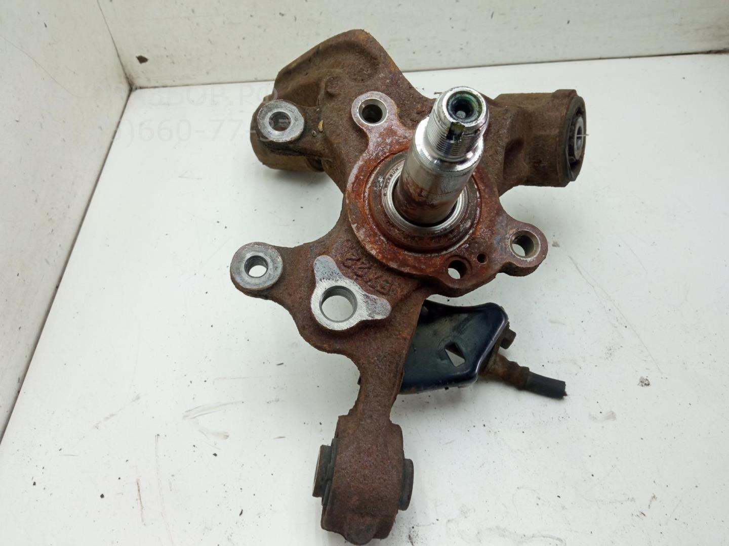 Кулак поворотный задний левый