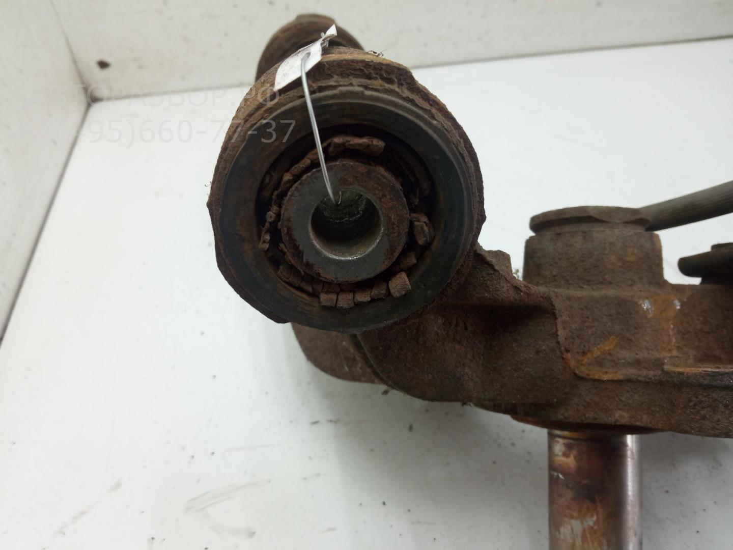 Кулак поворотный задний левый