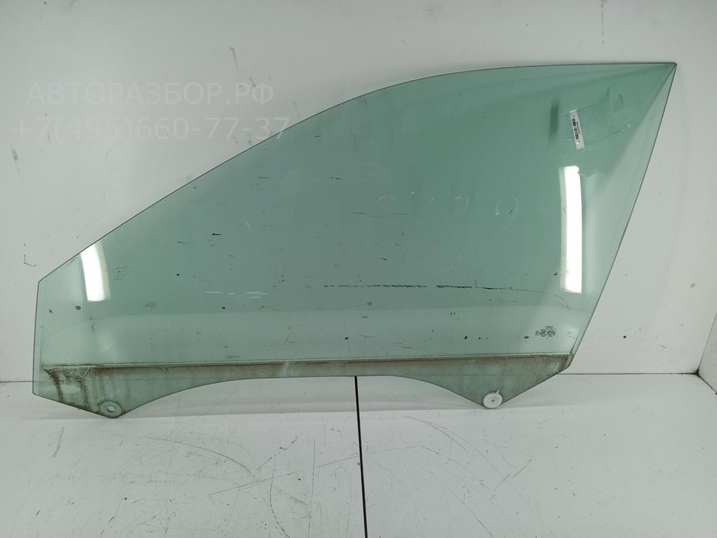 Стекло двери передней левой