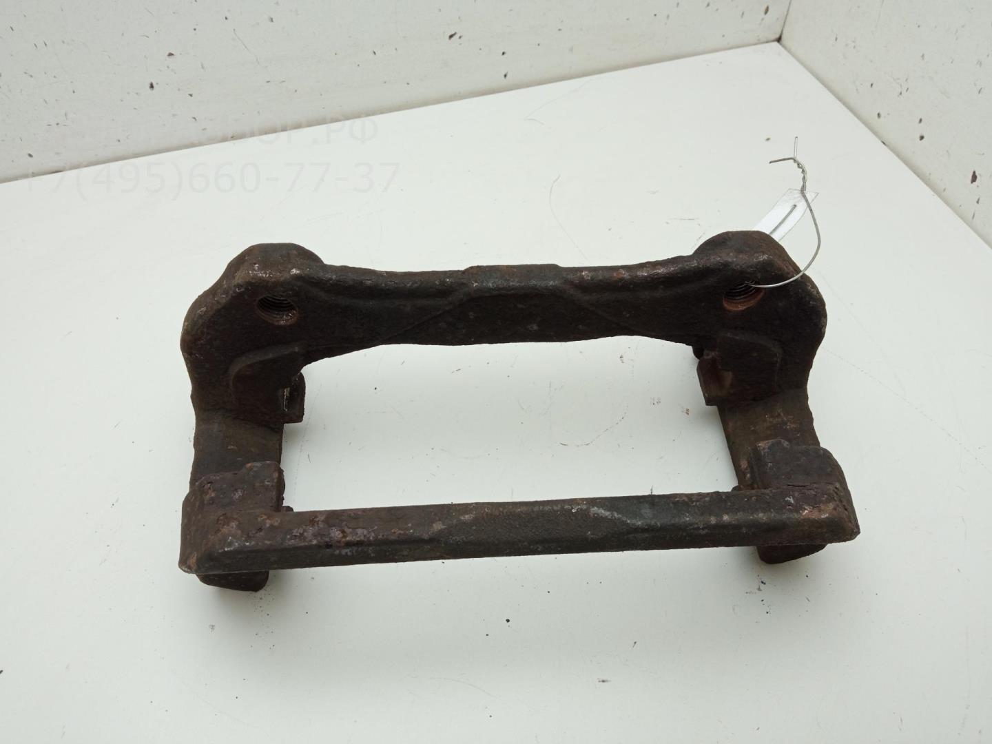 Скоба суппорта переднего