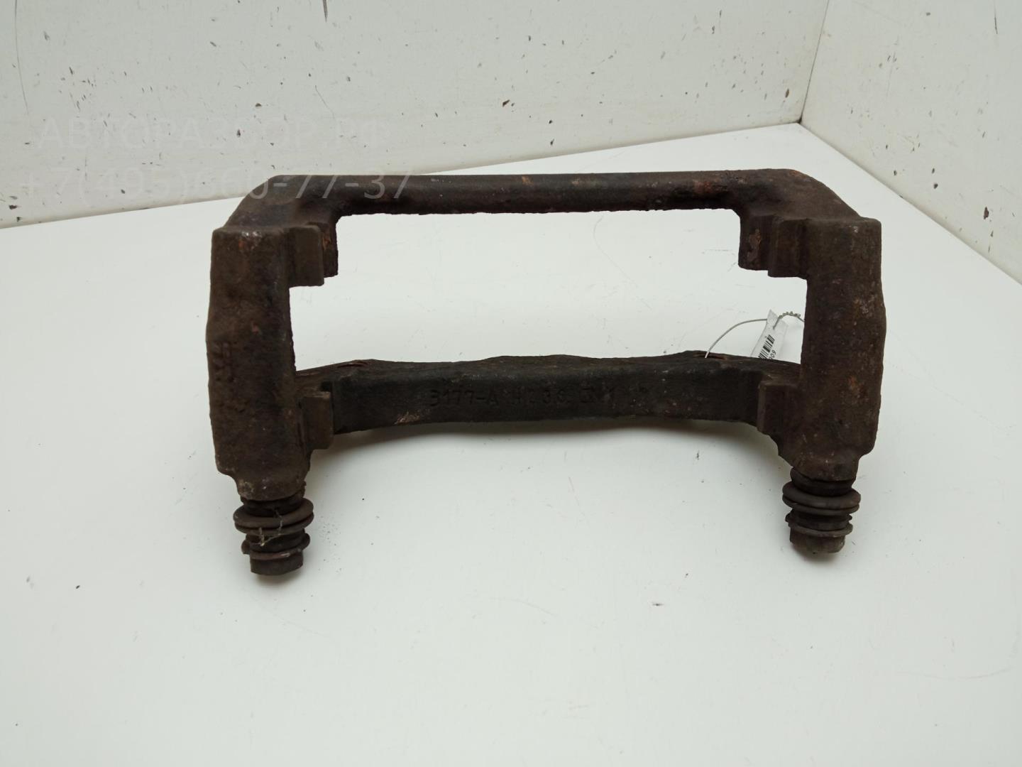 Скоба суппорта переднего