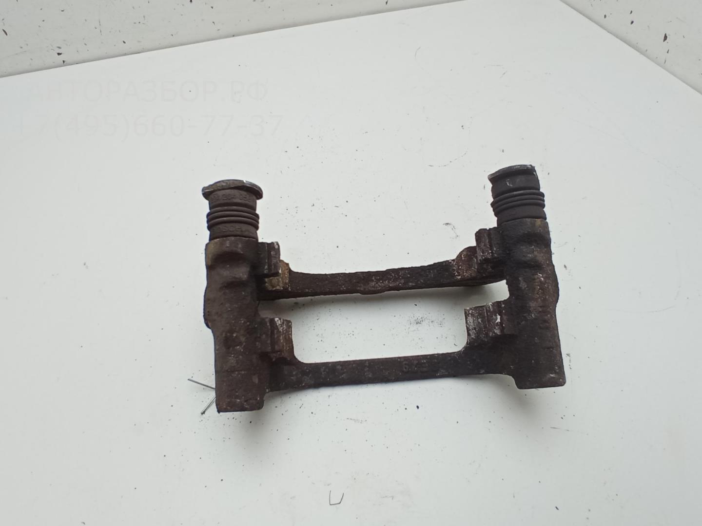 Скоба суппорта заднего