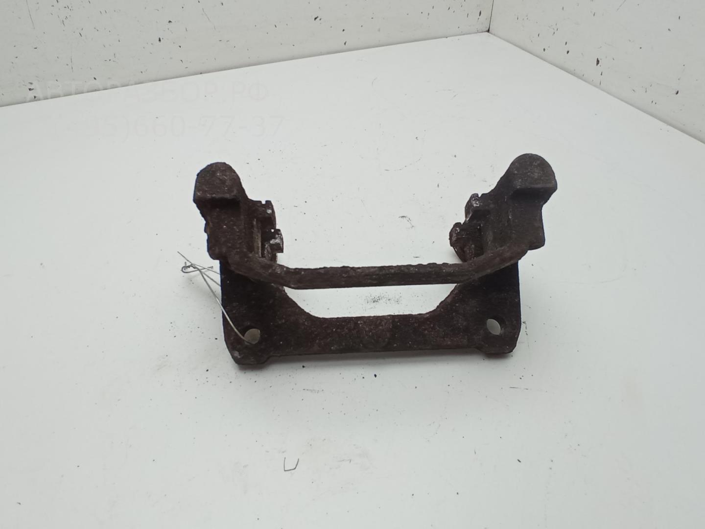 Скоба суппорта заднего