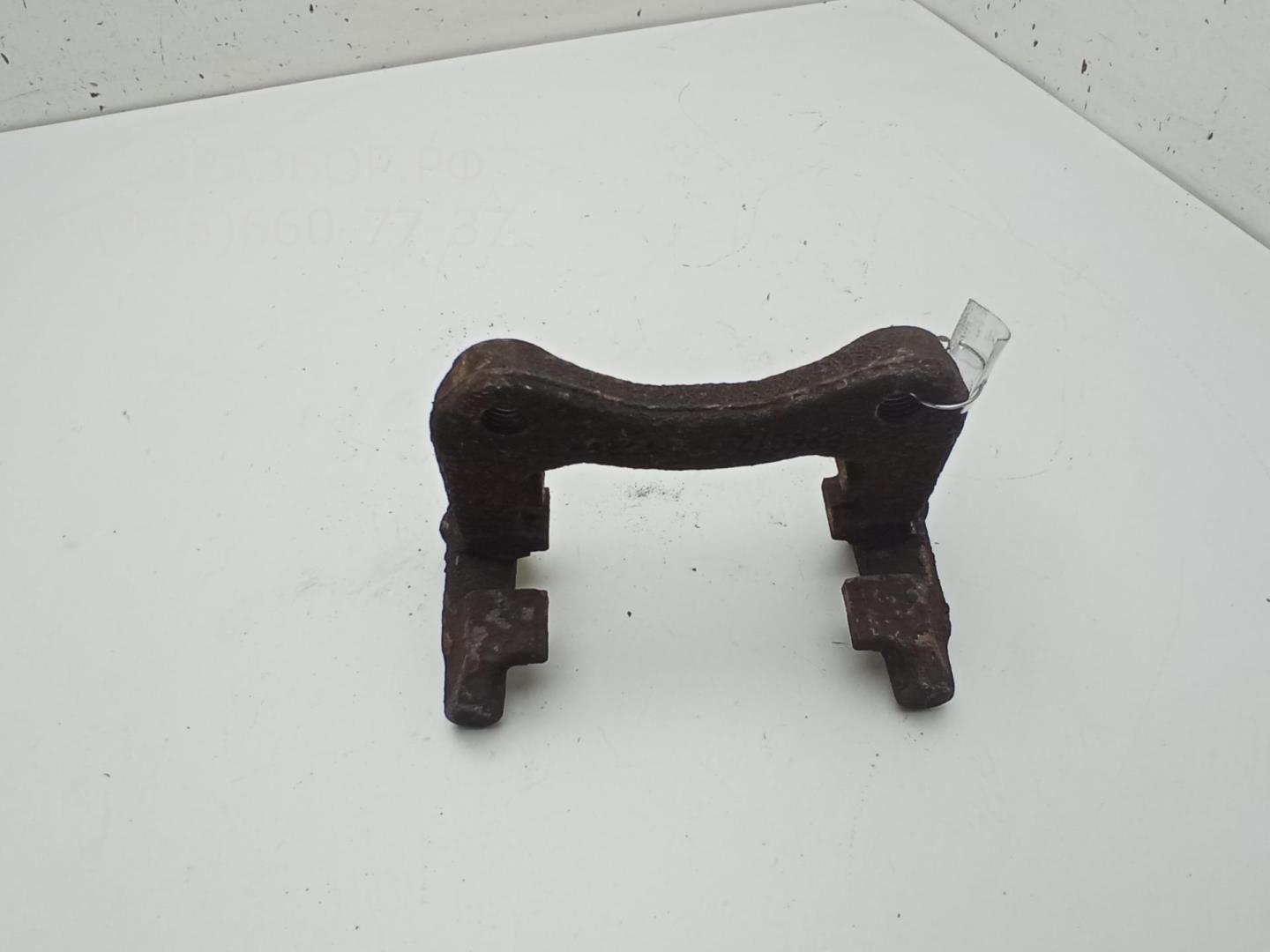 Скоба суппорта заднего