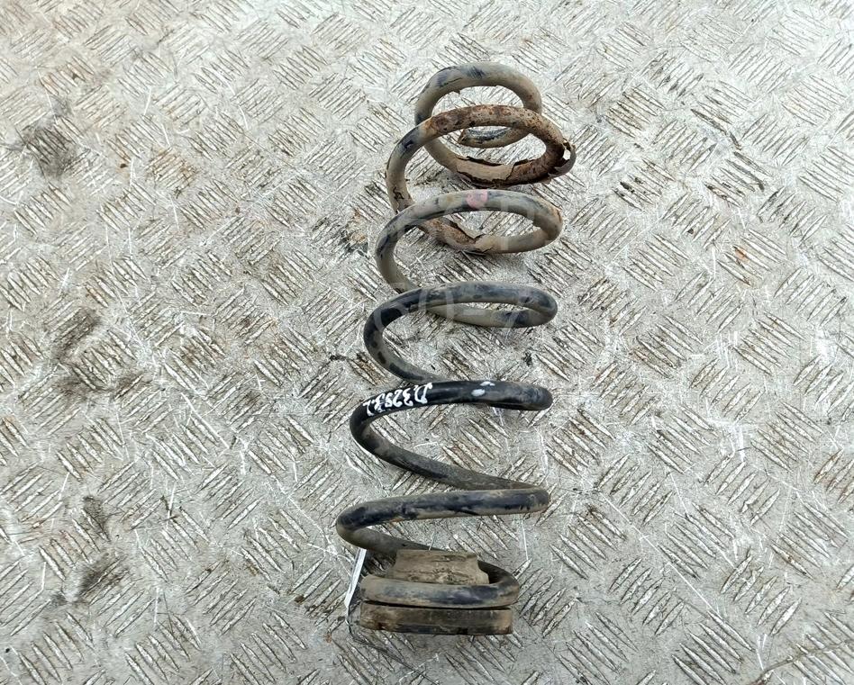 Пружина задняя