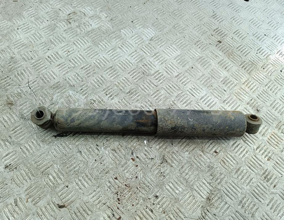 Амортизатор задний левый