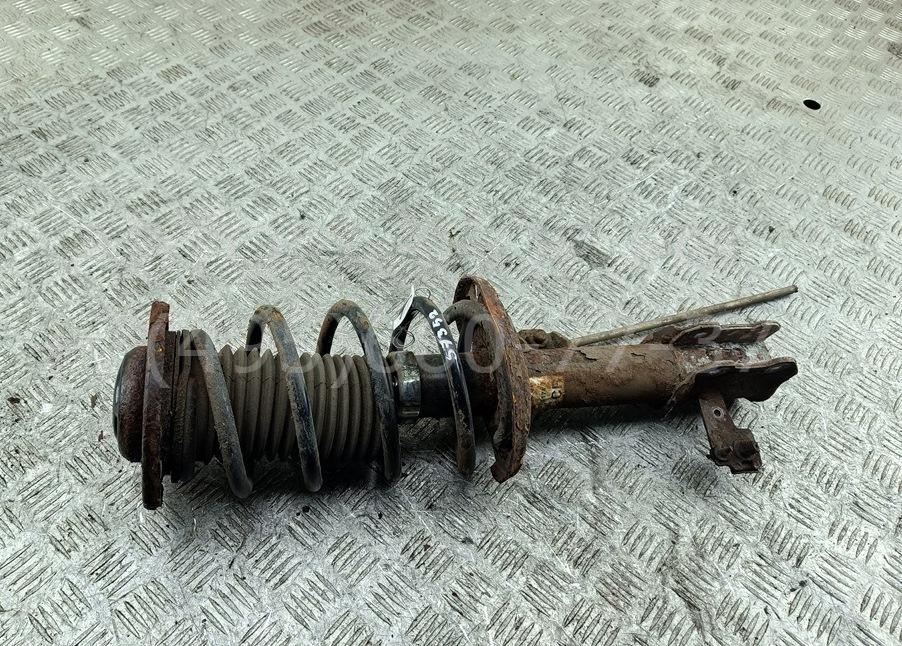 Амортизатор передний левый