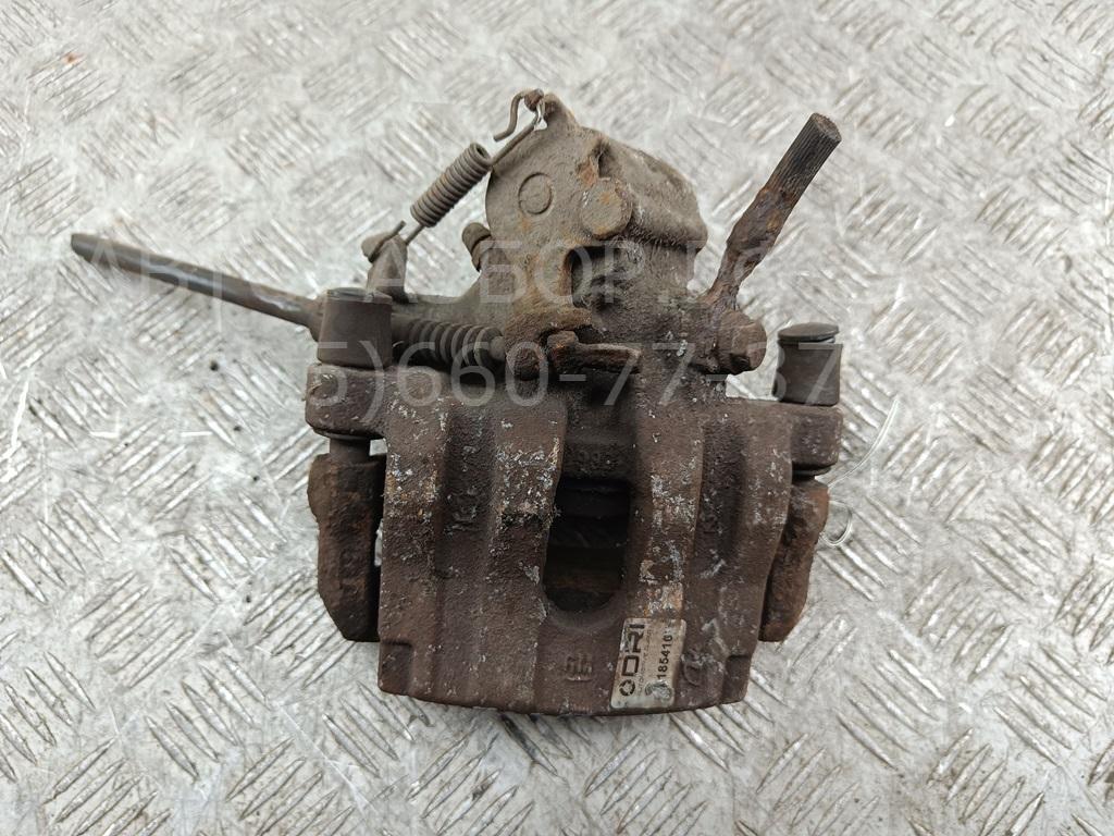 Суппорт задний левый