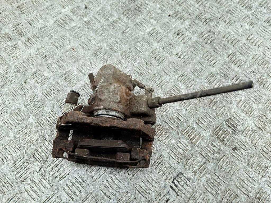 Суппорт задний левый