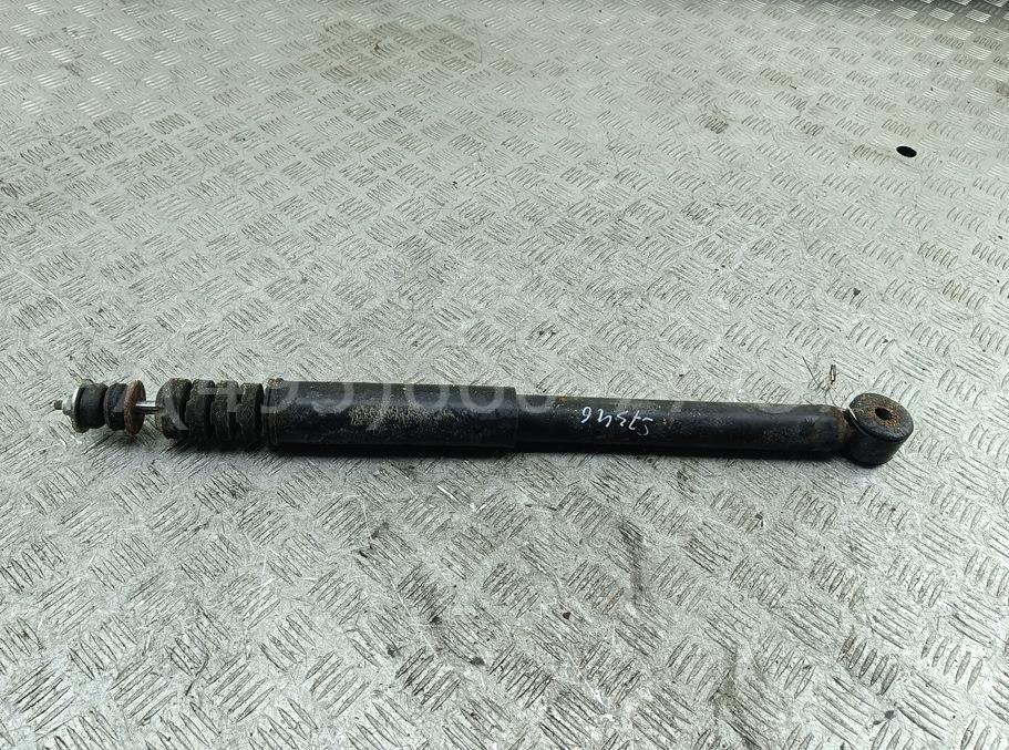 Амортизатор задний левый