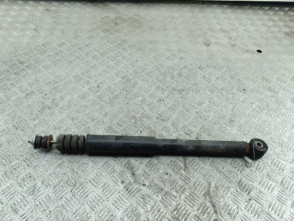 Амортизатор задний левый