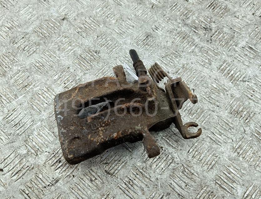 Суппорт задний левый