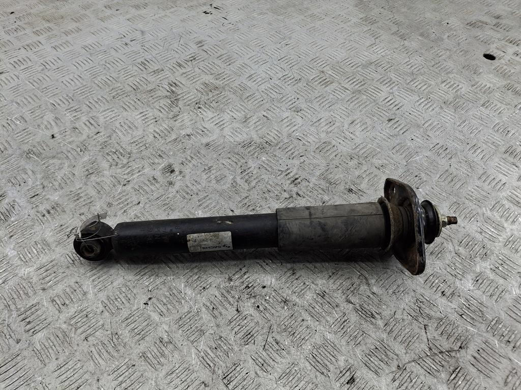 Амортизатор задний левый