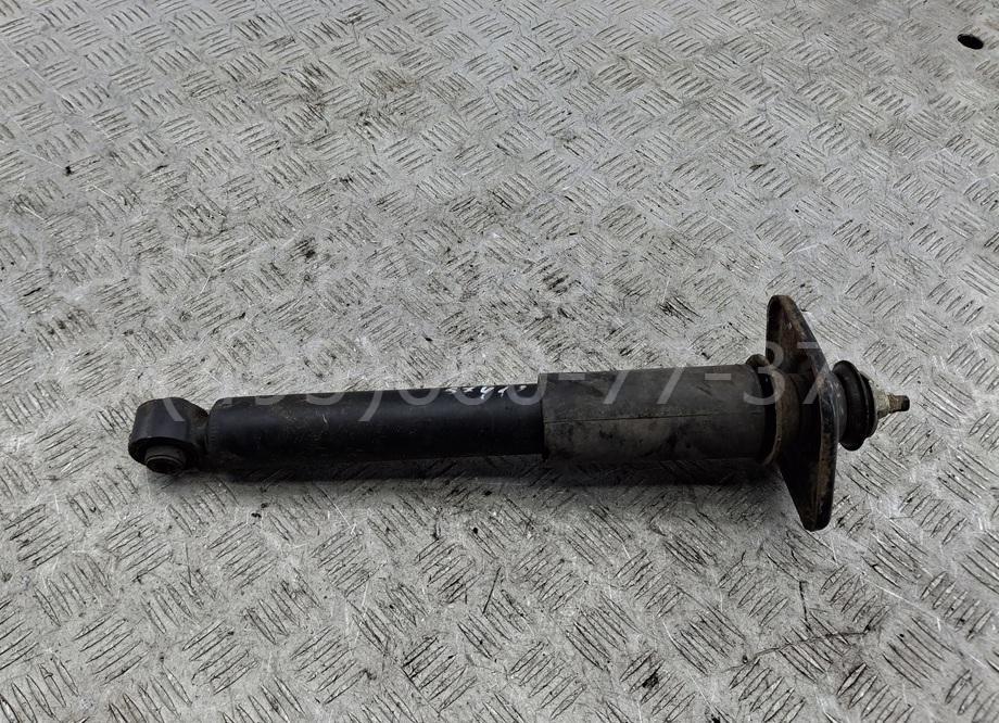 Амортизатор задний левый