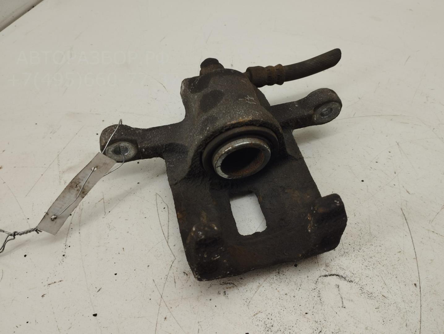 Суппорт задний левый