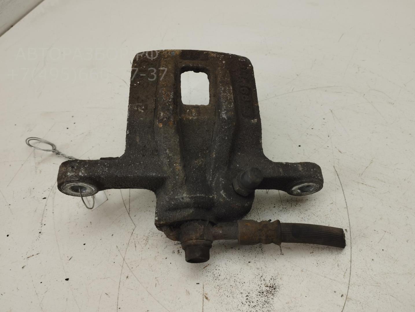 Суппорт задний левый