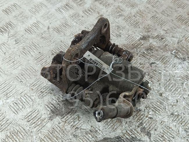 Суппорт задний левый