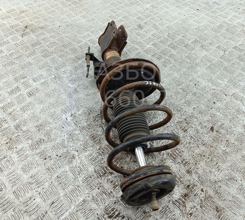 Амортизатор передний левый