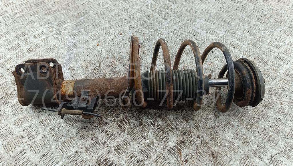 Амортизатор передний левый