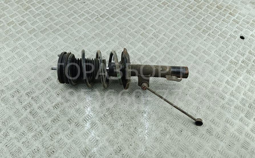 Амортизатор передний левый