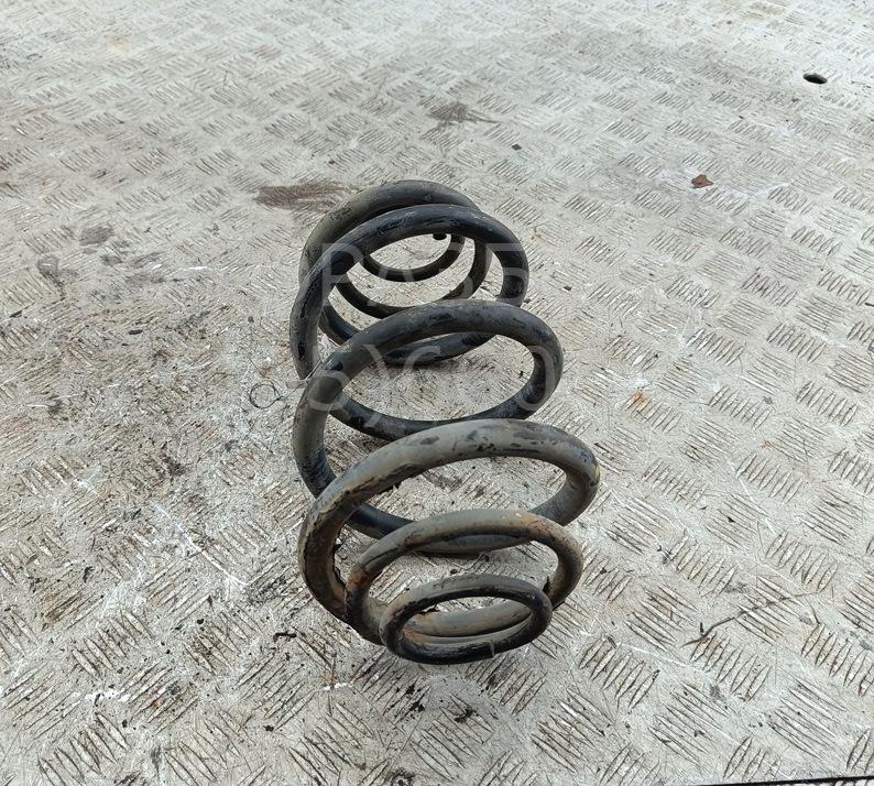 Пружина задняя