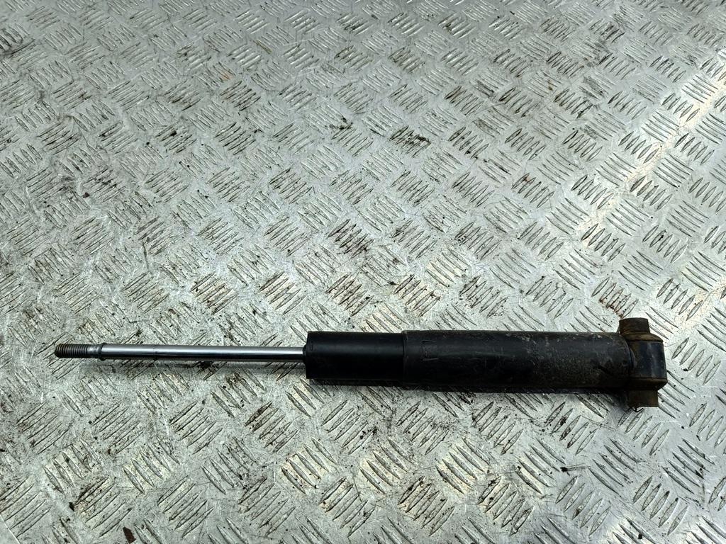 Амортизатор задний левый