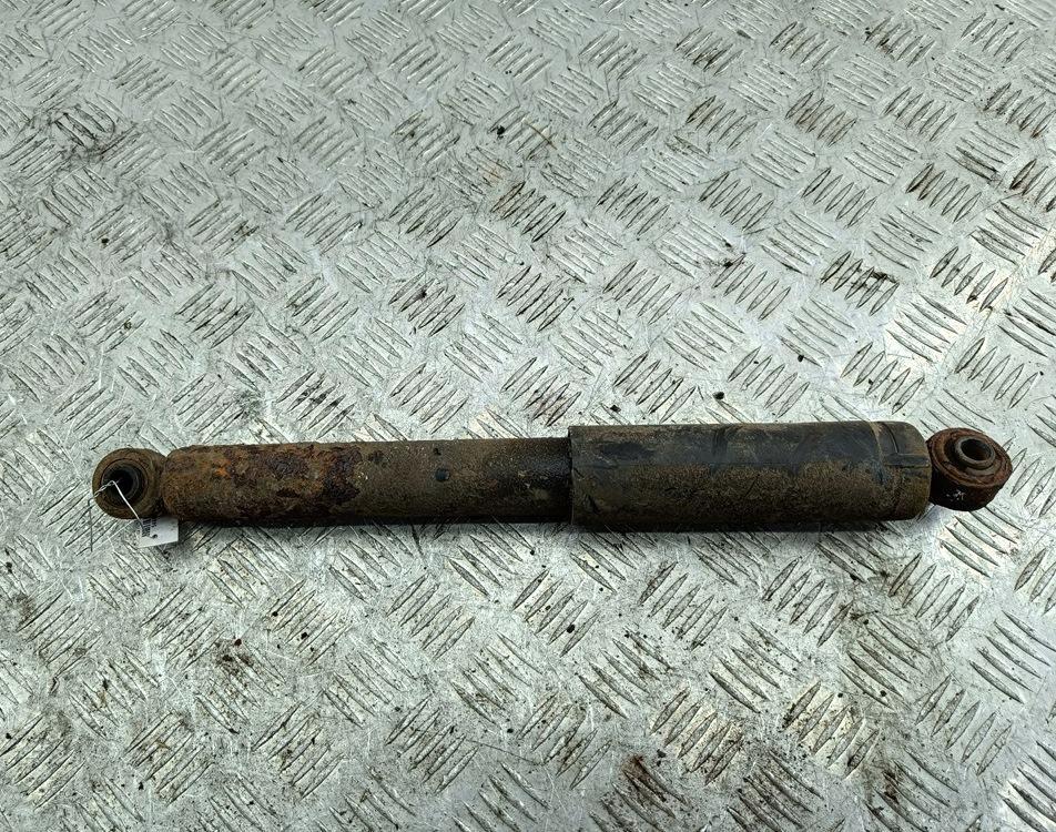 Амортизатор задний левый