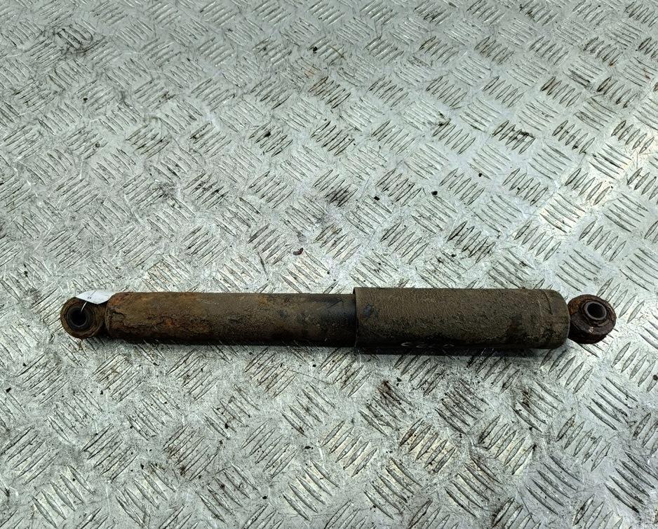 Амортизатор задний левый