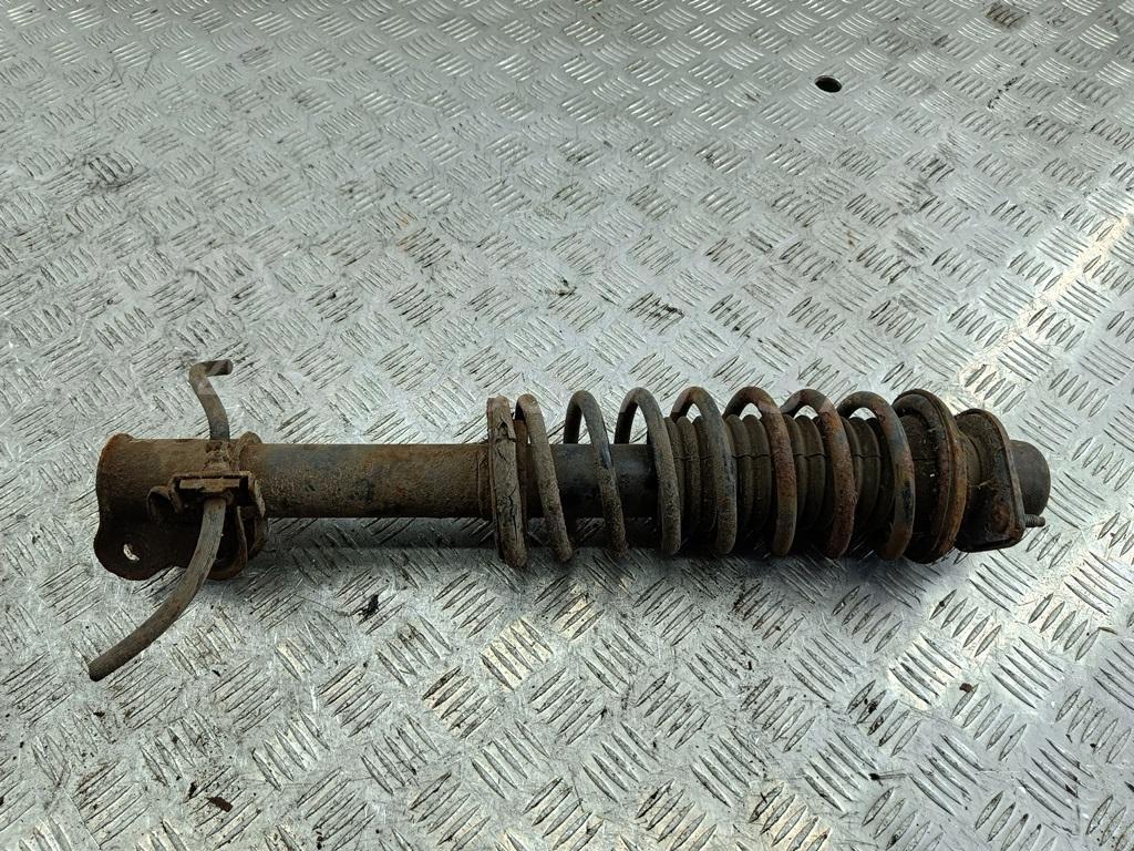 Амортизатор передний левый