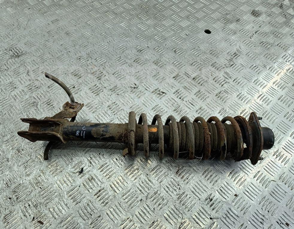 Амортизатор передний левый