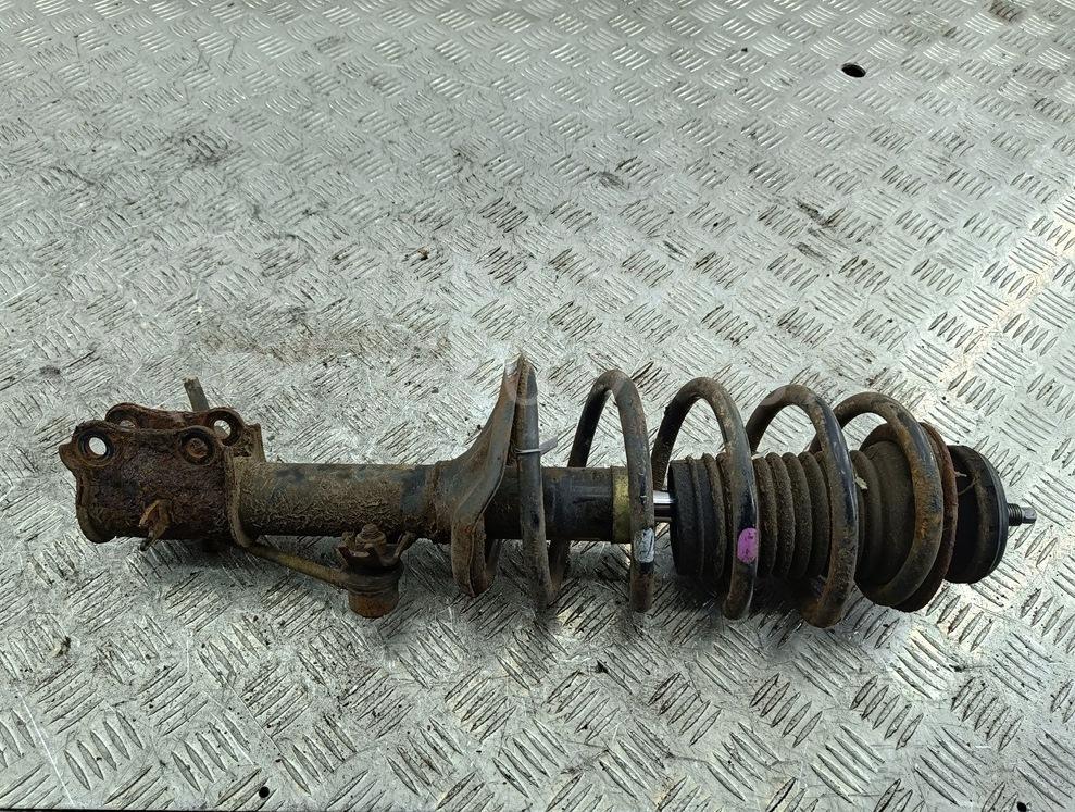 Амортизатор передний левый