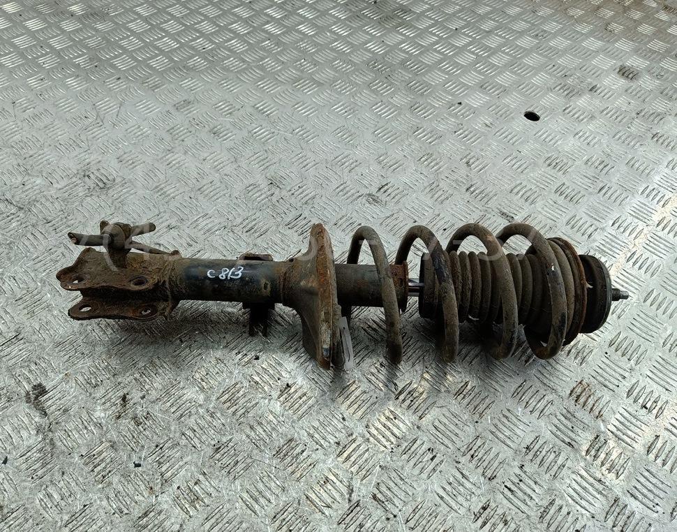 Амортизатор передний левый