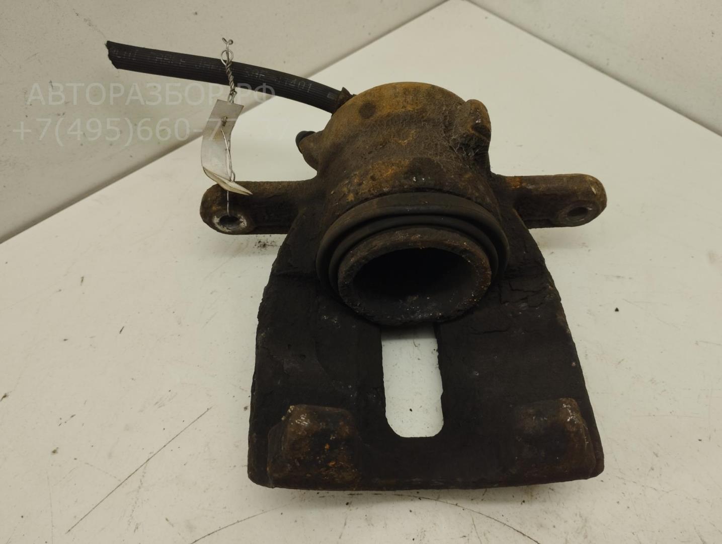 Суппорт передний левый