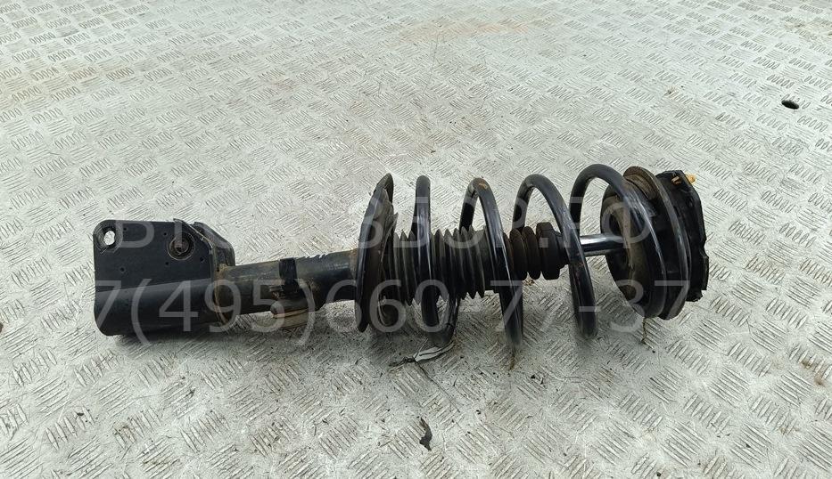 Амортизатор передний левый