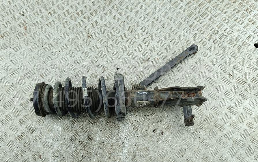 Амортизатор передний левый