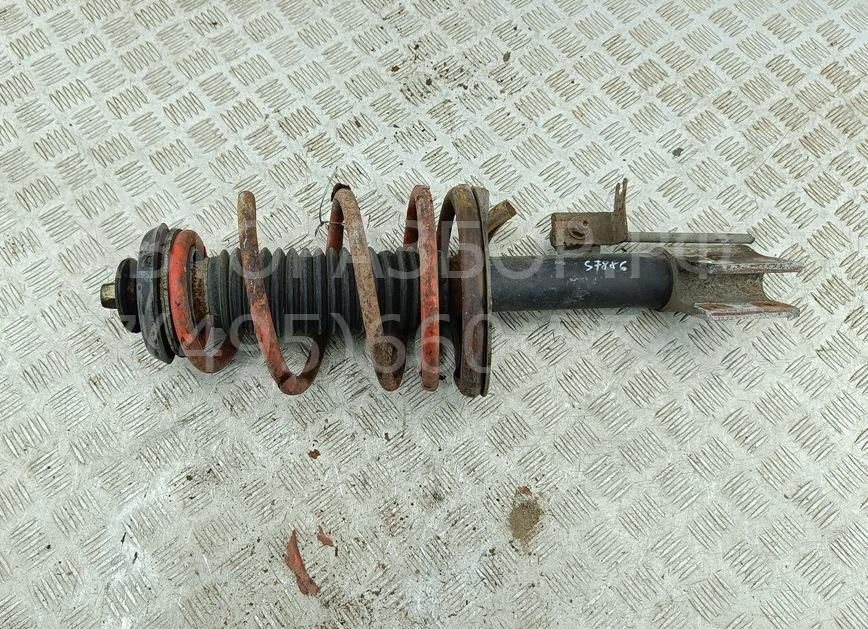 Амортизатор передний левый