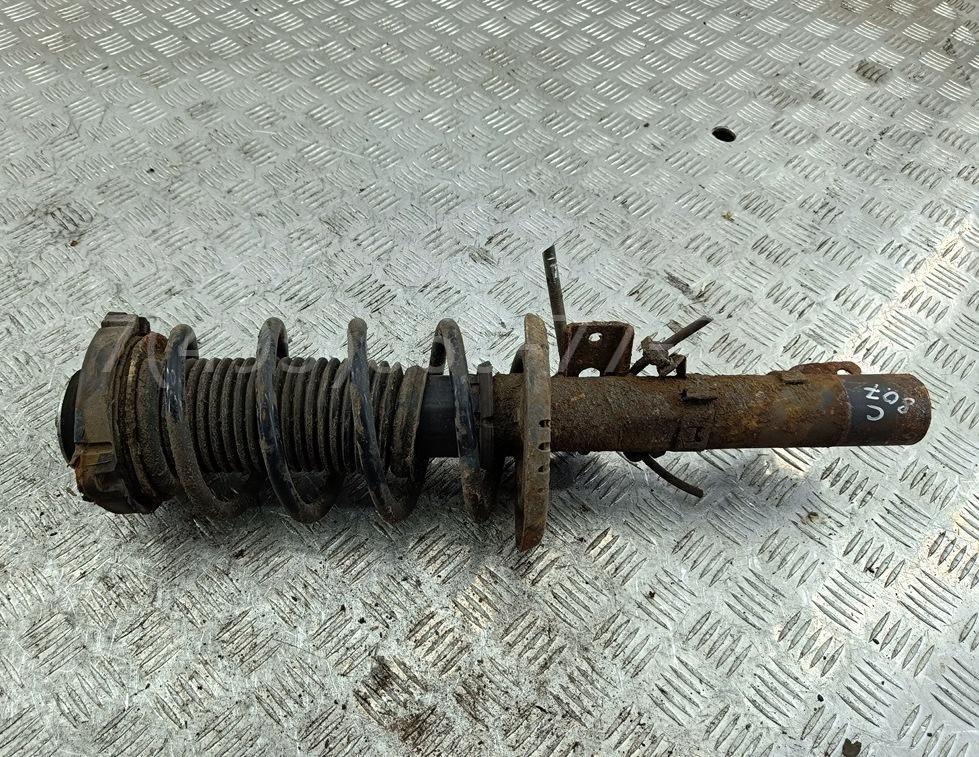 Амортизатор передний левый