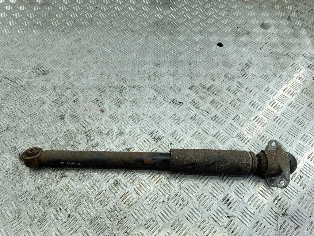 Амортизатор задний левый