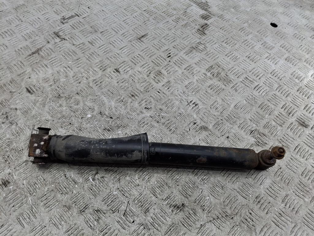 Амортизатор задний левый