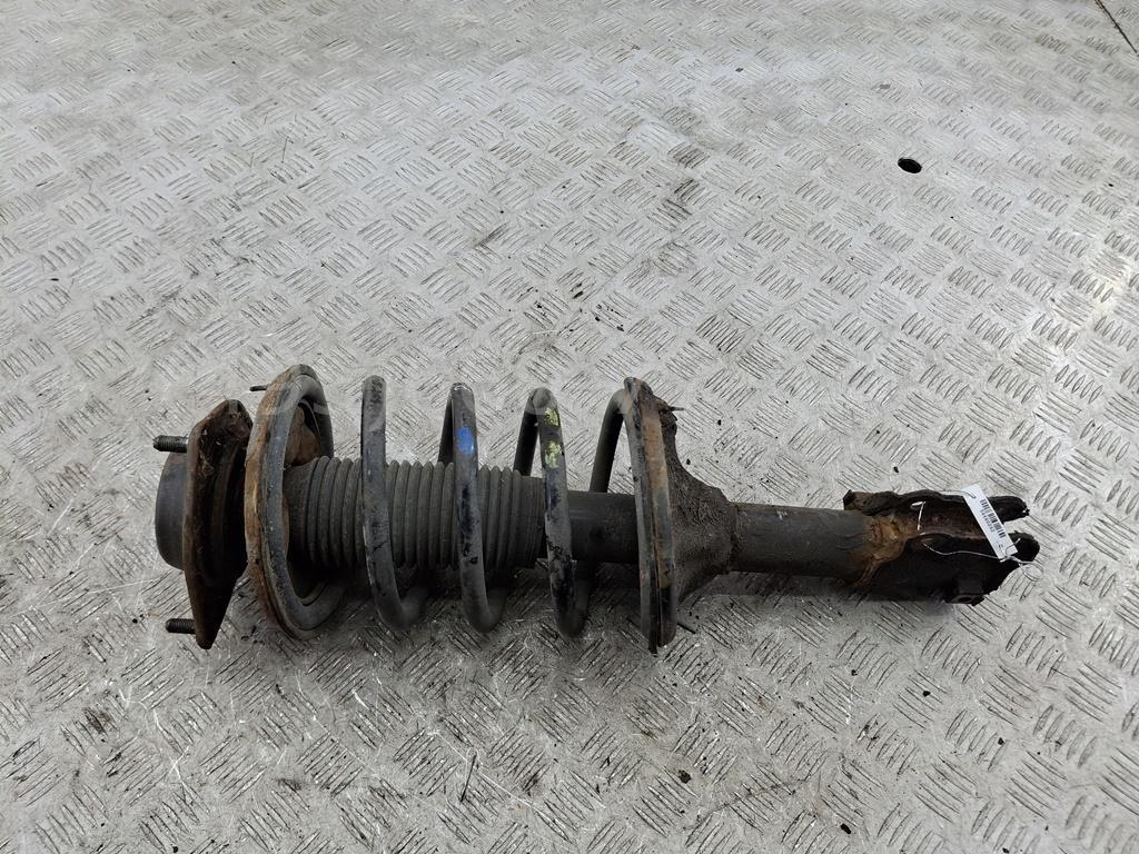 Амортизатор передний левый